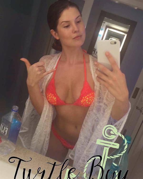 Amanda Cerny in a bikini taking a selfie