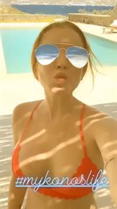 Lindsay Lohan in a bikini taking a selfie