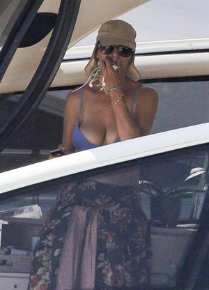 Uma Thurman wearing a bikini top on a yacht in St Tropez July 7, 2013 