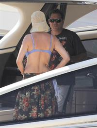 Uma Thurman wearing a bikini top on a yacht in St Tropez July 7, 2013 