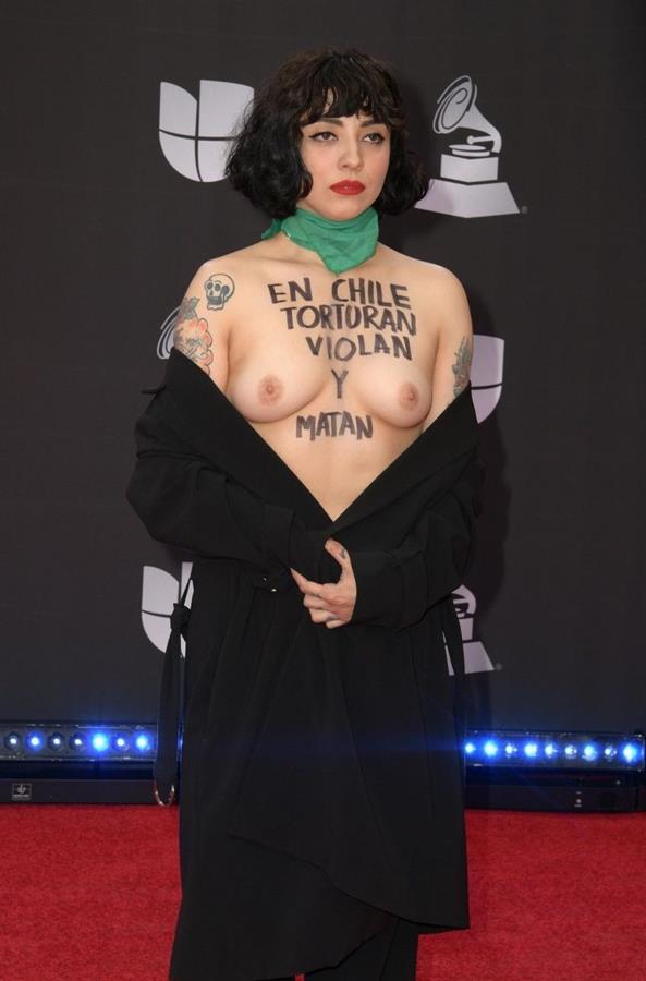 Mon Laferte nude boobs on the red carpet at the Latin Grammy Awards going topless.



















