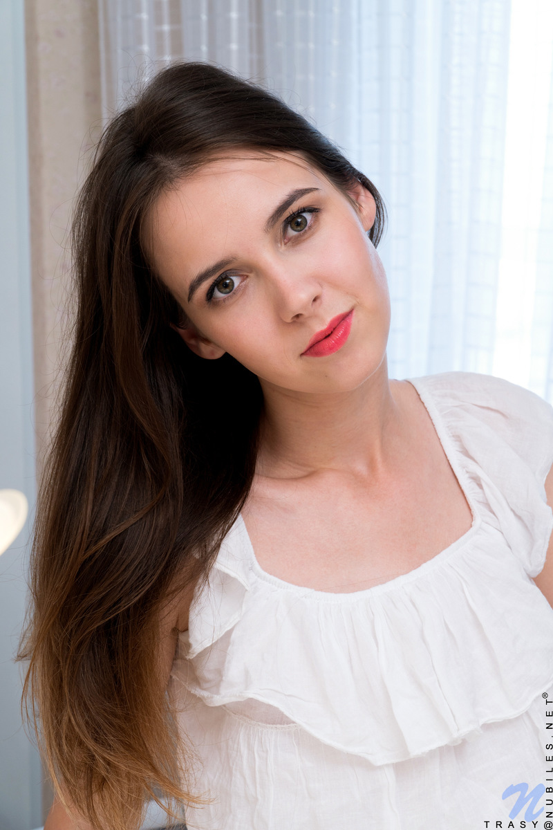 Like most teen girls, Trasy loves sweets. Peeling off her panties, she tweaks her puffy nips to hard peaks and then slides her talented fingers all the way into her tight little fuck hole to masturbate. Licking her fingers clean as she goes, she enjoys the sweetness of her homemade pussy juices.