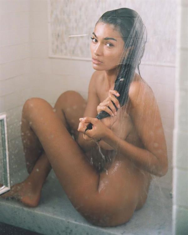 Kelly Gale nude new photos sitting naked in the shower showing off her big tits and ass as well as standing topless with a towel.
