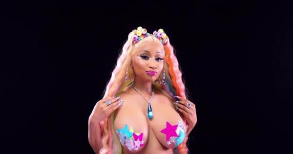 Nicki Minaj topless boobs with pasties covering her nude big tits in the new music video for TROLLZ.