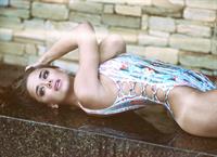 Dessie Mitcheson in a sexy and funky print, one piece swimsuit