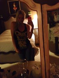 AJ Michalka taking a selfie