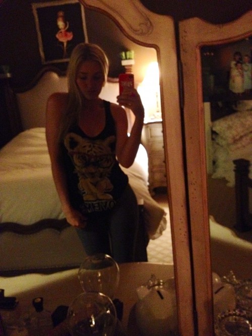 AJ Michalka taking a selfie
