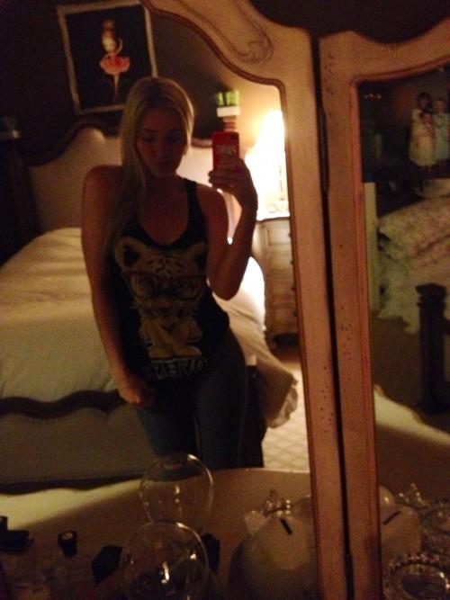 AJ Michalka taking a selfie