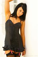  Penelope looking amazing in a black satin minidress