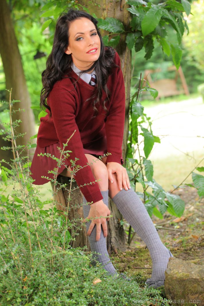  Dark haired college girl loves the outdoors and the passers by love the view of her slipping out of her uniform 