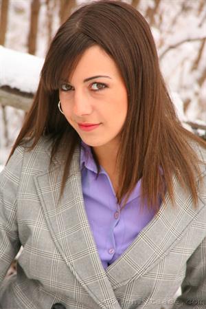  Emma H looking stunning in the snow in her sexy secretary outfit. 