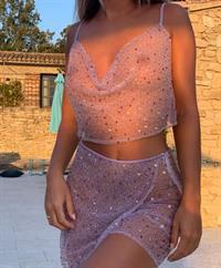 Mathilde Tantot braless boobs in a see through outfit showing off her big tits and sexy ass in a revealing photoshoot by her pool.