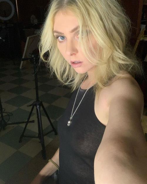 Taylor Momsen Pictures Taylor Momsen braless boobs in a see through black top showing off her big tits in a sexy new selfie.