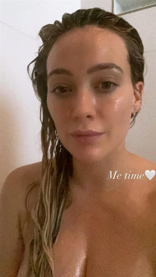 Hilary Duff nude boobs new covered selfie naked in the shower covering her topless big tits.