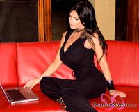 Denise Milani Photoset - Red Sofa