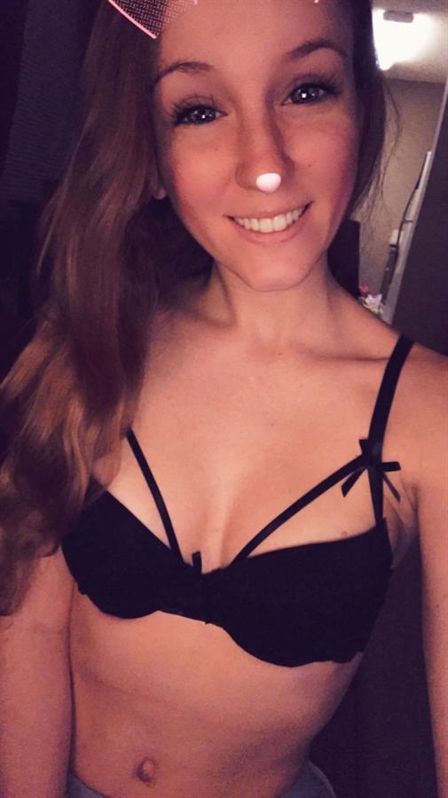 Meredith in lingerie taking a selfie