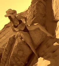 Kelly Monaco black desert bikini