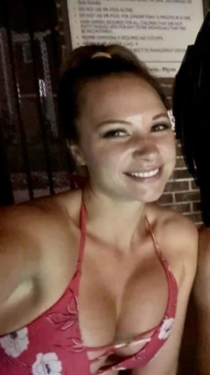 Teri in a bikini taking a selfie