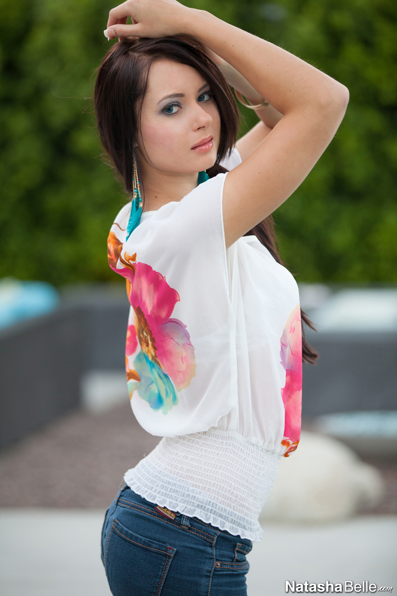 Natasha Belle outdoors in a white flower shirt and white underwear