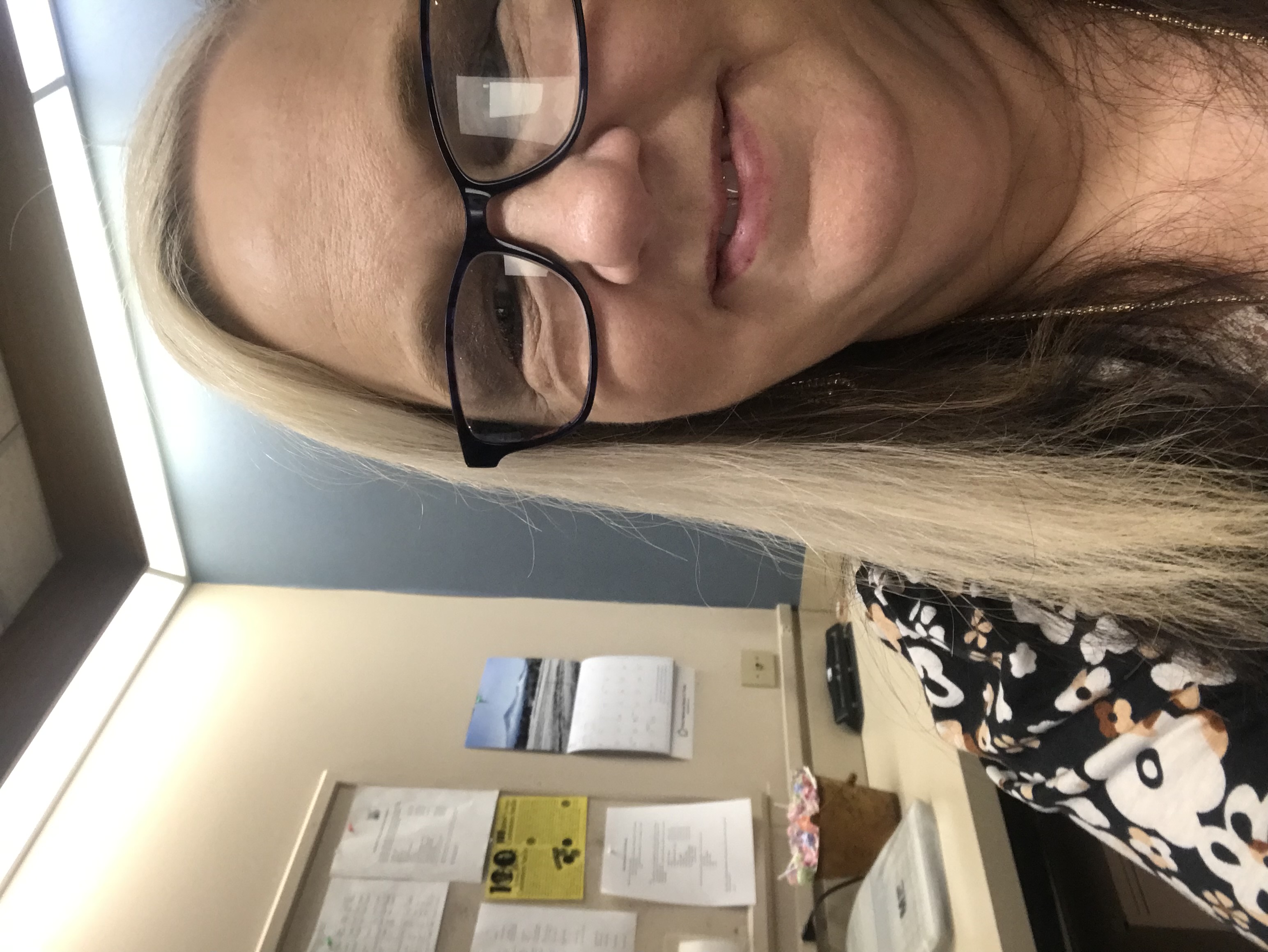 tulsa bank lady taking a selfie