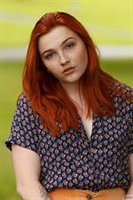 Curvy Rae Frederickson in a Yellow Skirt