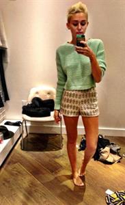 Miley Cyrus taking a selfie