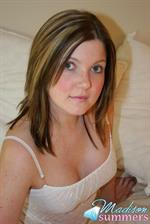 Madison Summers strips down on a white bed