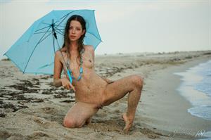 Mika - Umbrella at the Beach