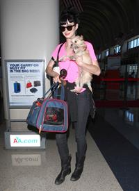 Krysten Ritter - Prepares to leave LAX in Los Angeles, California - June 8, 2012 