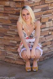 Ashton shows her pussy outside