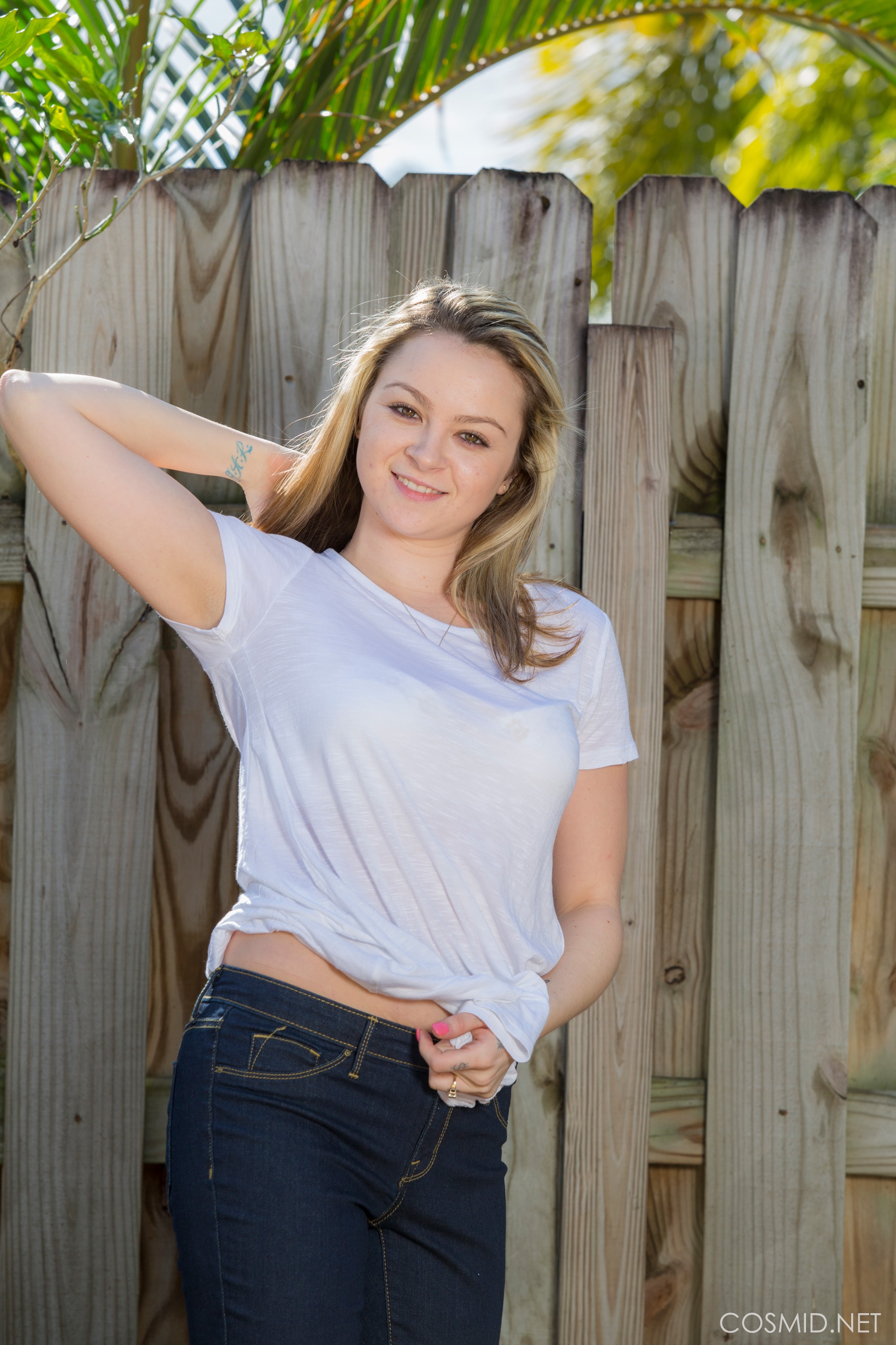 Samantha Against The Fence