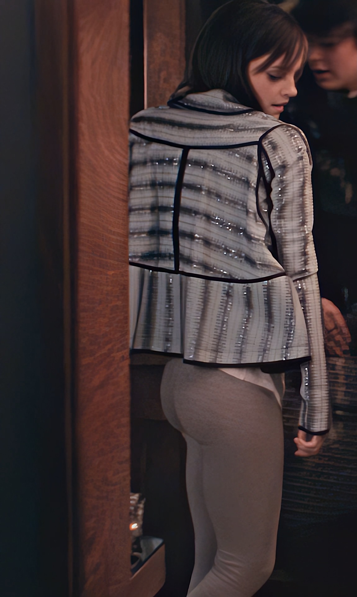 A teasing flash of Emma Watson’s asscheeks outlined in tight leggings from  The Bling Ring 