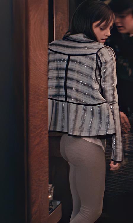 A teasing flash of Emma Watson’s asscheeks outlined in tight leggings from  The Bling Ring 