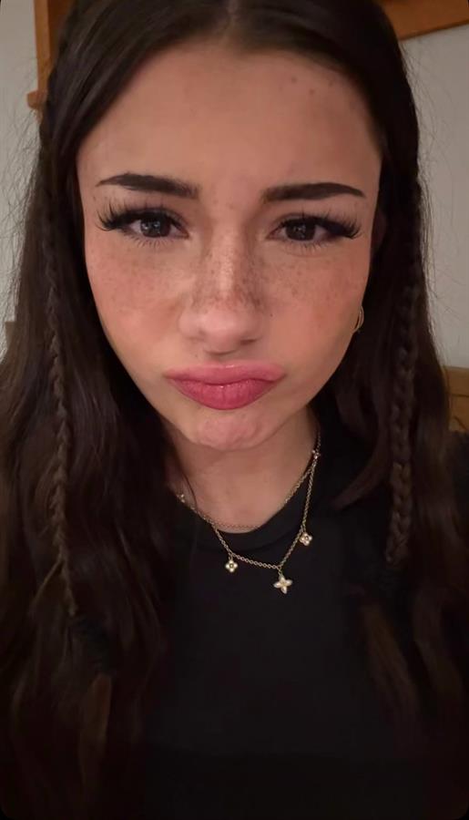 Mikayla Campinos taking a selfie