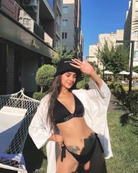 Kubra Camlibel in a bikini
