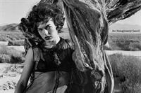 Milla Jovovich in a bikini