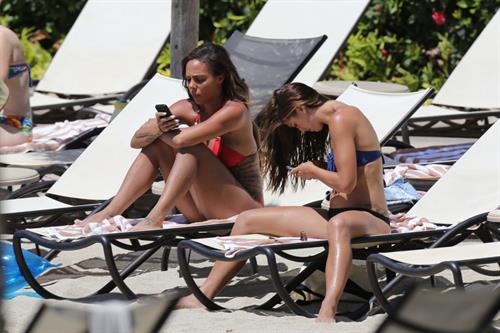 Alex Morgan and Sydney Leroux in bikinis on the beach in Hawaii