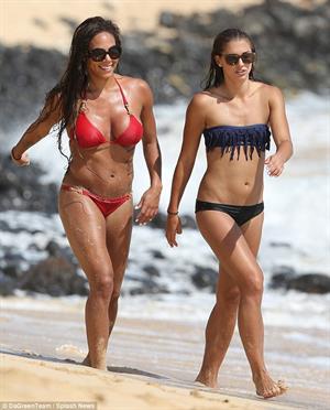 Alex Morgan and Sydney Leroux in bikinis on the beach in Hawaii