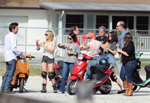 Selena Gomez rides a scooter on set of spring breakers on February 29, 2012 