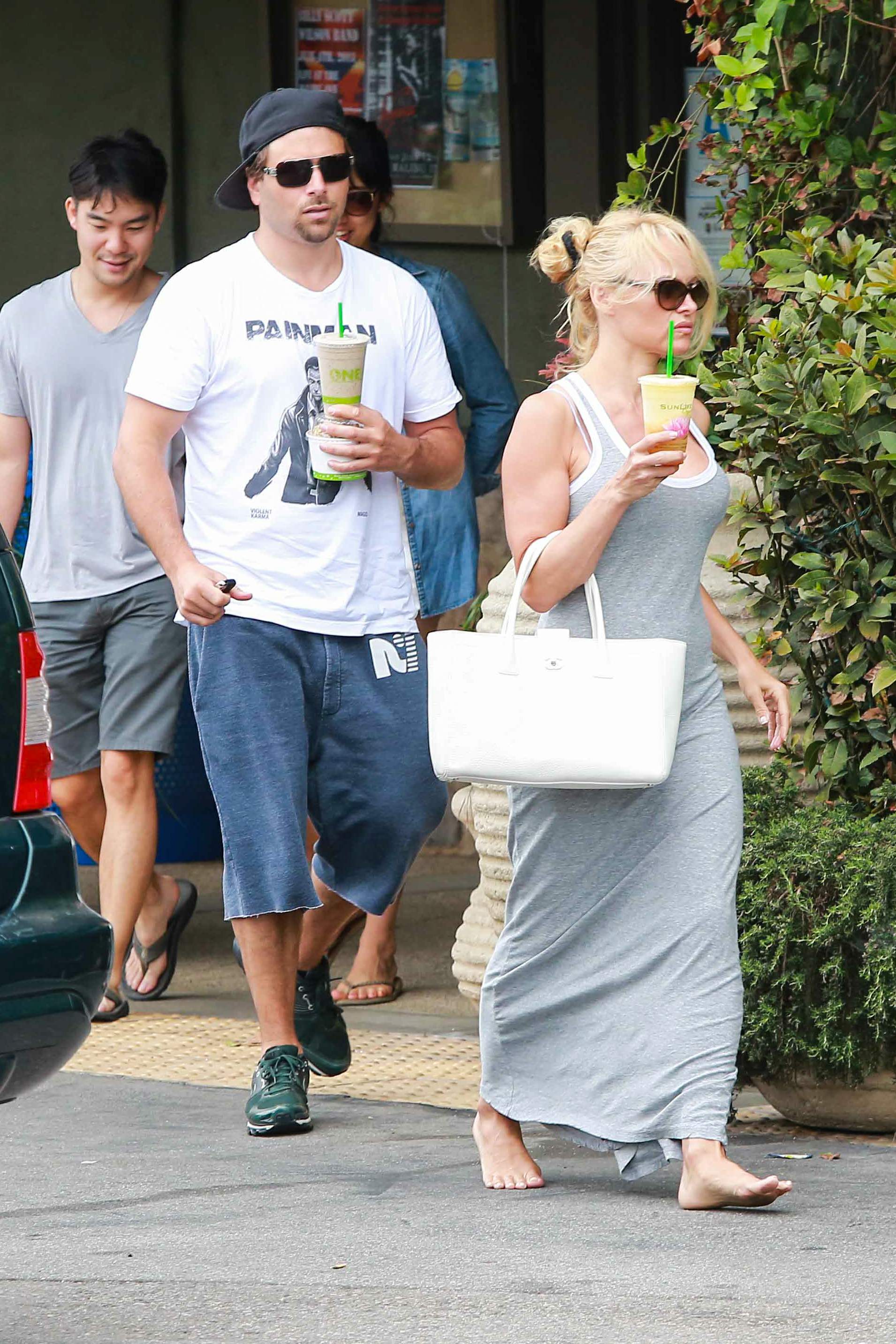 Pamela Anderson Pictures Pamela Anderson leaves barefoot a local Restaurant with a friend in Malibu July 6, 2013